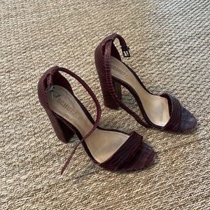 Schutz red python heels